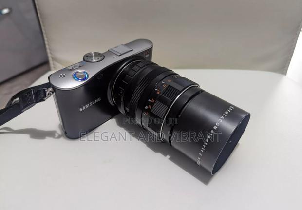 Samsung Nx100 Camera With 20-50mm Lens+ Pentacon 2.8 135mm · Photo 1