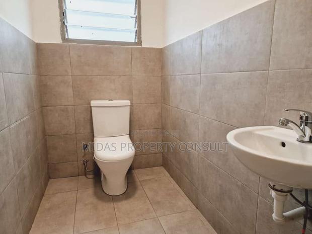 98x100ft Land With a House for Sale at Adenta Village · Photo 3