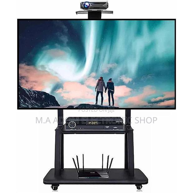 Tv Stand for Large Screen Between 65”-75” · Photo 1