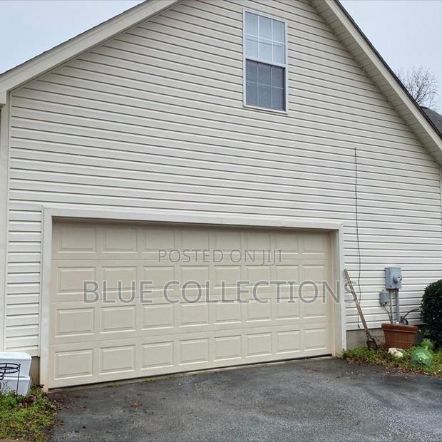 12×8 Morden Automated Garage Door · Photo 1