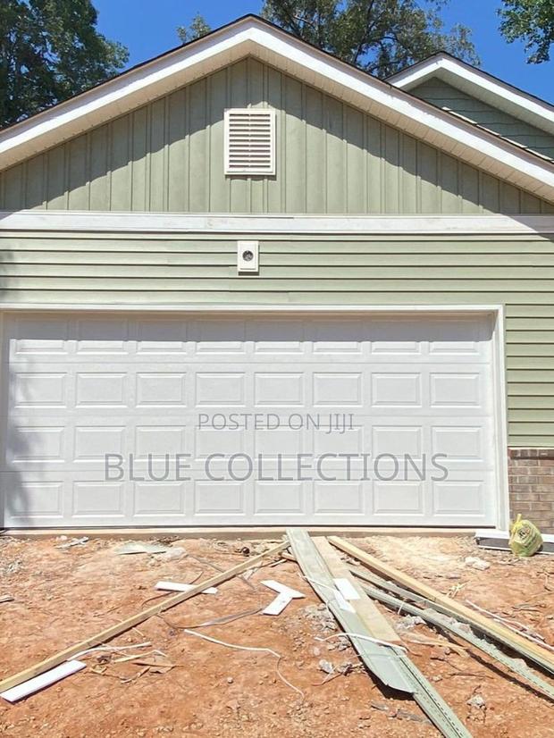 Automated Garage Door · Photo 1