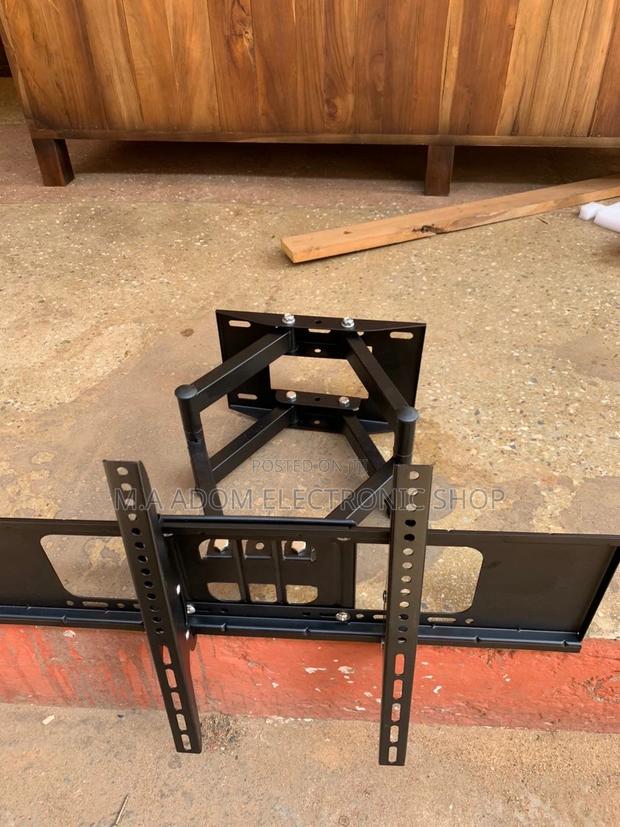 Classic Design Adjustable Wall Mount for Tv Between 42-80”. · Photo 1