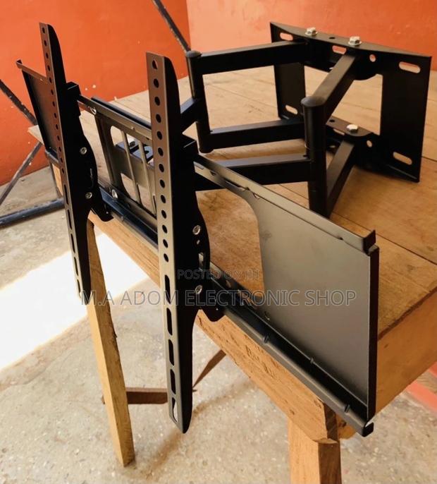 Long Lasting Adjustable Wall Mount for Tv Between 42”-80”. · Photo 1