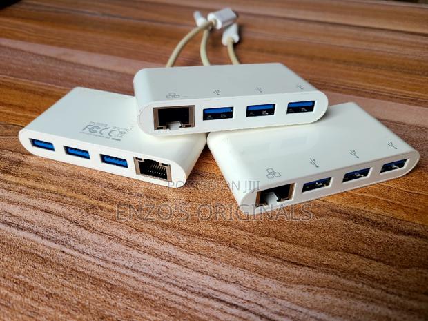 USB-C to Gigabit Lan Rj45 Ethernet + 3port USB Hub · Photo 1