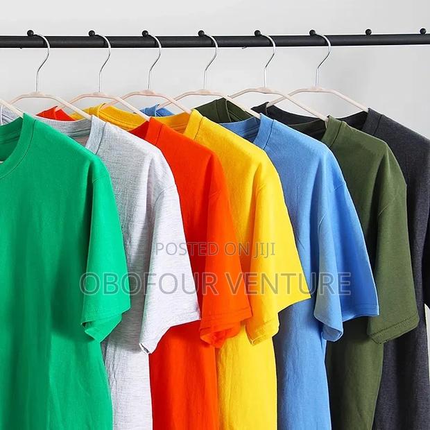 Soft, Stylish, and Made in the USA! Get the Best Quality Tee · Photo 1