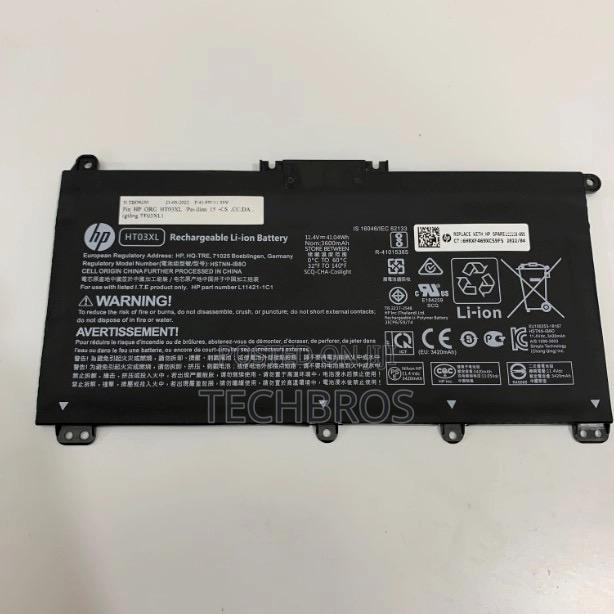 Hp Genuine Ht03xl Battery for Hp Pavilion · Photo 1
