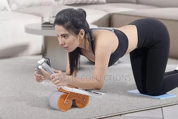 Automatic Rebound Abdominal Muscles Wheel · Photo 1