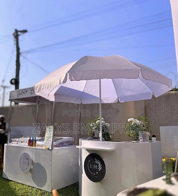 Plain White Parasol Umbrellas · Photo 1