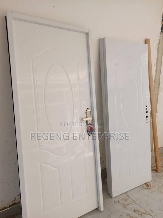 White Wooden Door With Accessories. · Photo 1