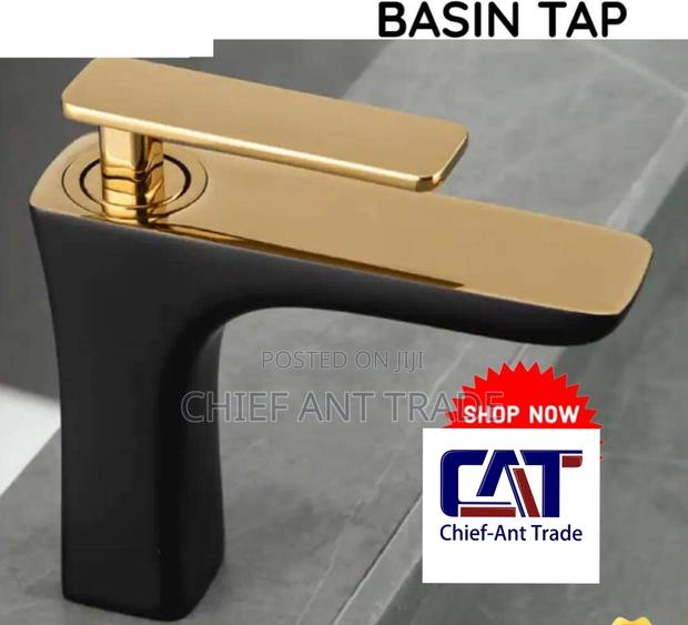 Black and Gold Basin Tap / Faucet. Hot Cold · Photo 1
