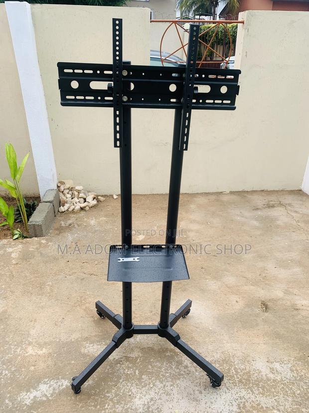 Durable Mobile Tv Stand With Rolling Stand · Photo 1