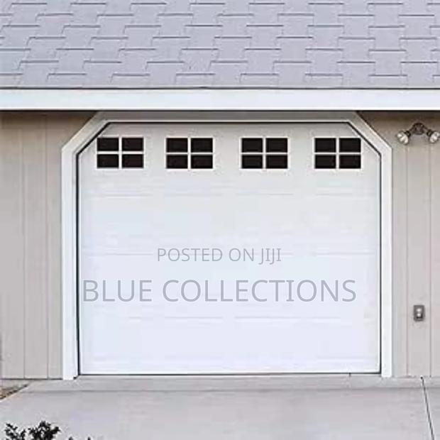 9×8 Stylish Automated Garage Door · Photo 1