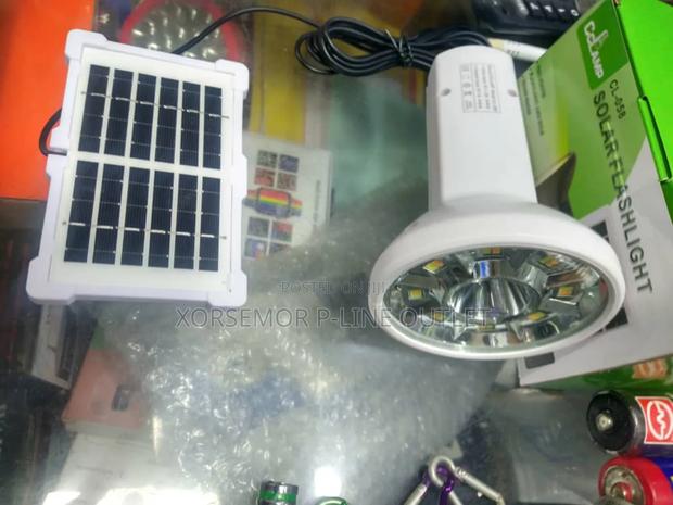 Cclamp Solar and Electric Flashlight · Photo 2