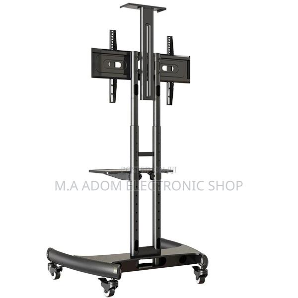 Movable Tv Trolley for TVS Between 32”-75” · Photo 1