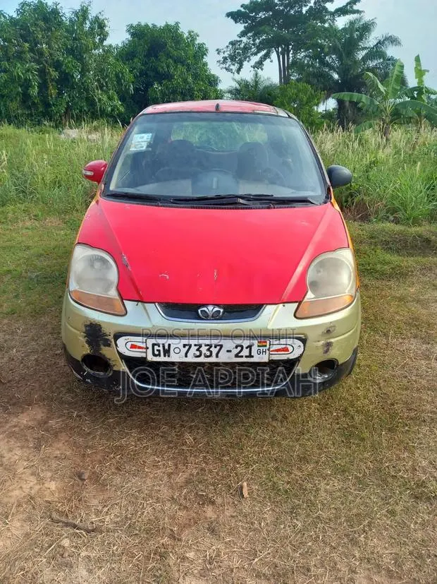 Chevrolet Matiz 2010 Red · Photo 1