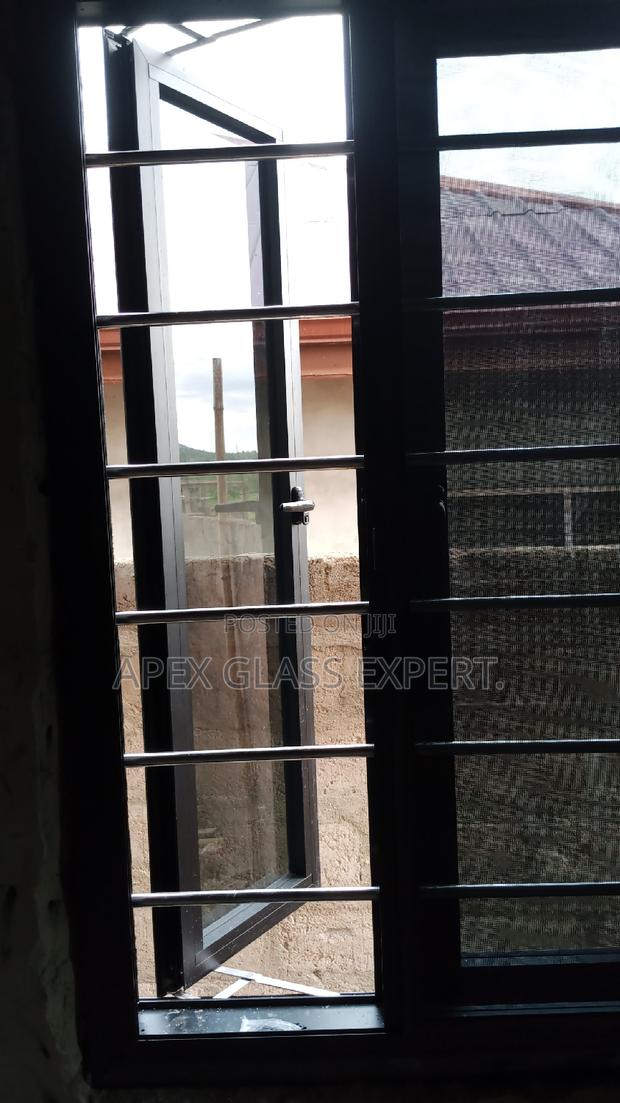 Casement Window With Burglary Proof Attached · Photo 2