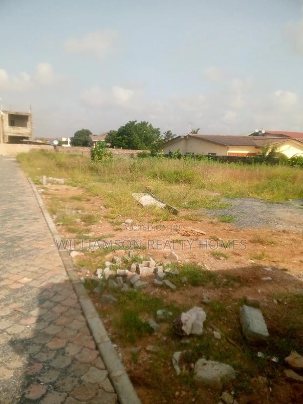 Titled Road Side Walled and Gated Land for Sale,Spintex · Photo 1
