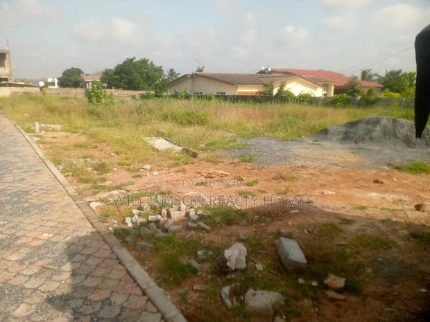 Titled Road Side Walled and Gated Land for Sale,Spintex · Photo 2