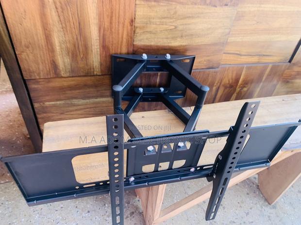 Quality Full Motion TV Wall Mount for Most 32-75 Inch. · Photo 1