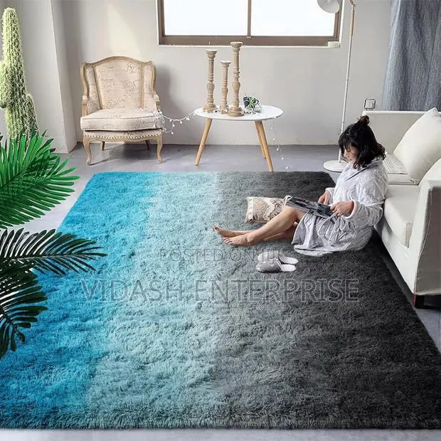 "Create a Cozy Atmosphere With Our Plush Center Rugs." 200/300cm · Photo 1