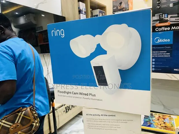 Place Your Order Ring - Floodlight Cam Plus Outdoor Wired 1080p Camera · Photo 1