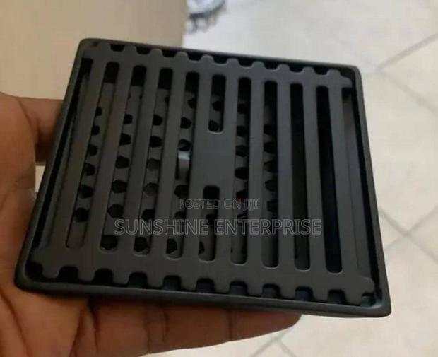 All Black Bathroom Floor Drain · Photo 1