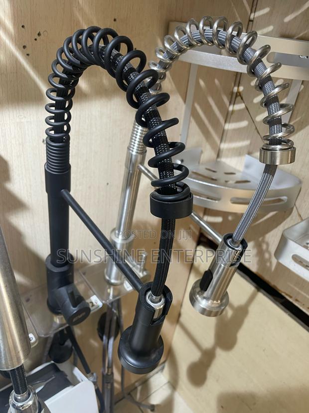 Spring Pull Out Hot And Cold Kitchen Sink Tap · Photo 1
