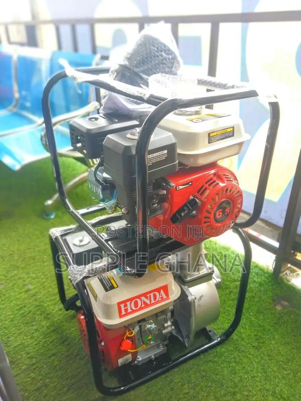 Red Honda Water Pump Machine Water Pump Machine Water Pump · Photo 1