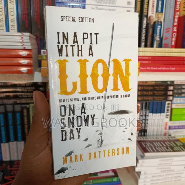 In a Pit With a Lion · Photo 1