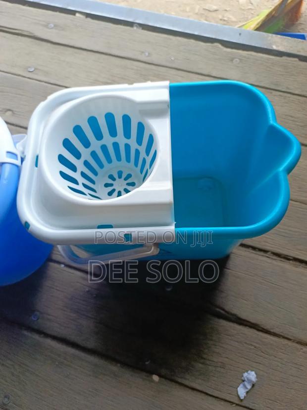 Cleaning Mop Buckets · Photo 2