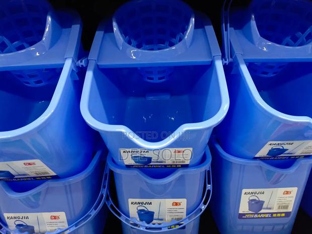 Cleaning Mop Buckets · Photo 3