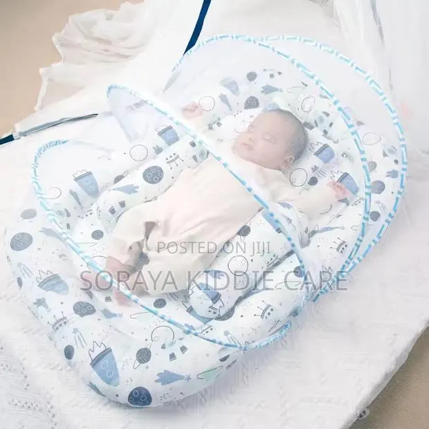 Baby Portable Foam Bed With Side Pillows and Net · Photo 1