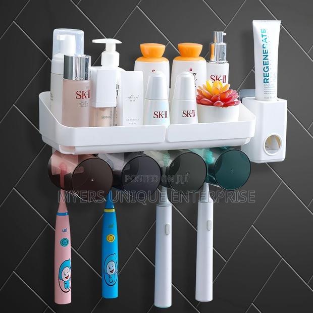 Latest Toothpaste Dispenser Toothbrush Holder With Cups · Photo 1
