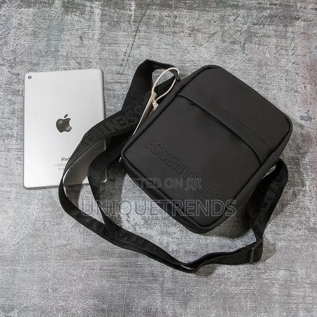 Essentials Crossbody Bags · Photo 1