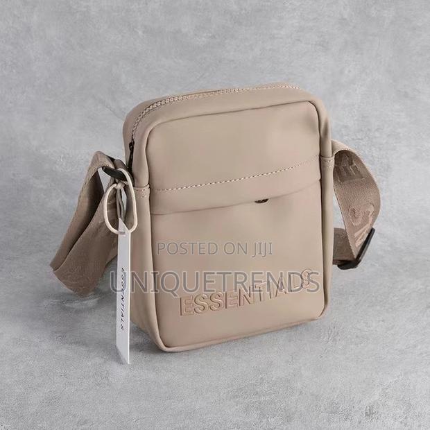 Essentials Crossbody Bags · Photo 1