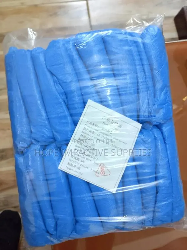 Disposable Shoe Cover - Waterproof. · Photo 1