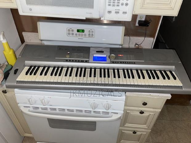 Yamaha_ DGX 205_ 76 Key_ Grand Piano · Photo 2