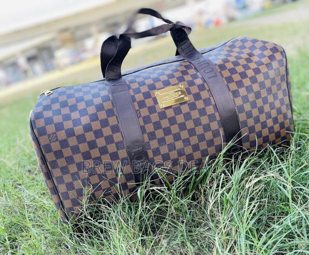 Branded Louis Vuitton Coffee Brown Duffle Traveling Bag · Photo 1