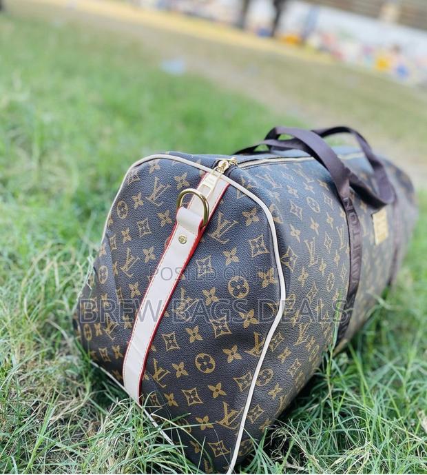 Branded Louis Vuitton Coffee Brown Duffle Traveling Bag · Photo 1
