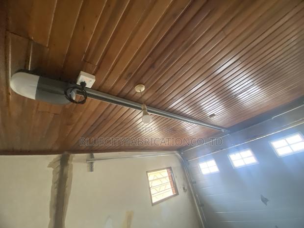 Foreign Automated Garage Doors We Have All Sizes · Photo 1