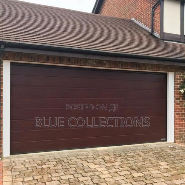 14×8 Imported Automated Garage Door · Photo 1