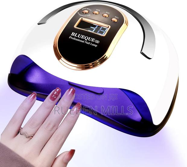 Hands in Lights on Automatic Sensor Professional Nail Dryer · Photo 1