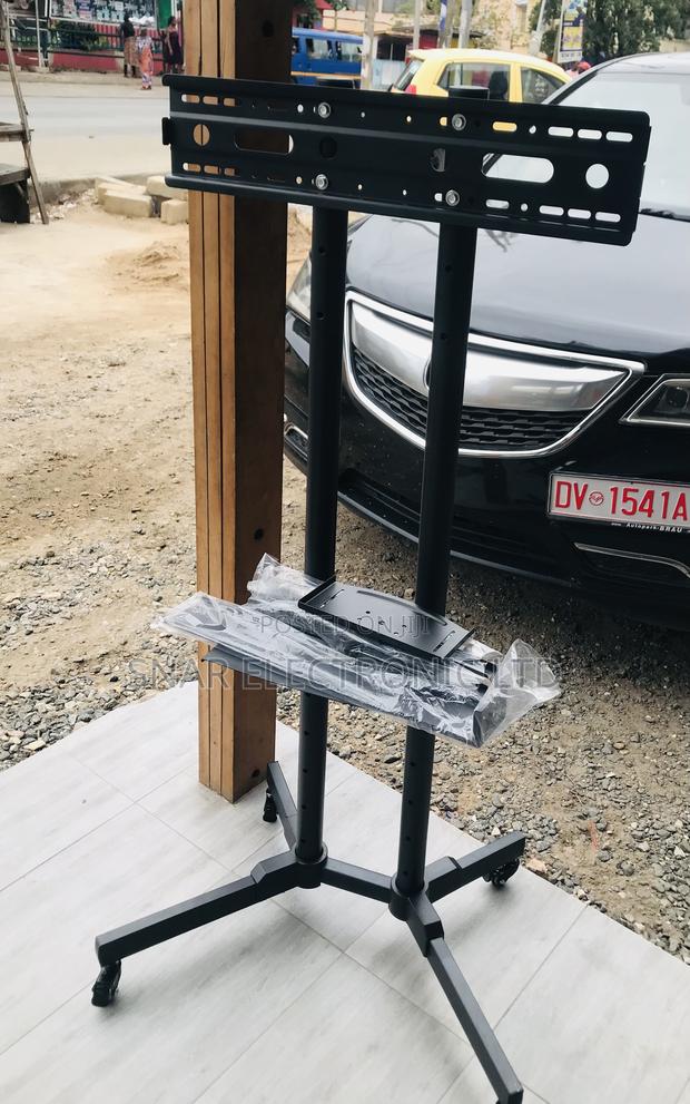 Mobile TV Stand With Wheels Height Adjustable 32-65" · Photo 1