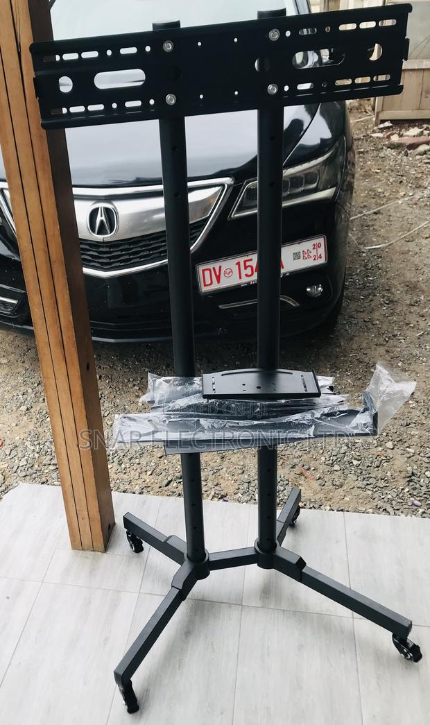 Highly Mobile TV Stand With Wheels Height Adjustable · Photo 1