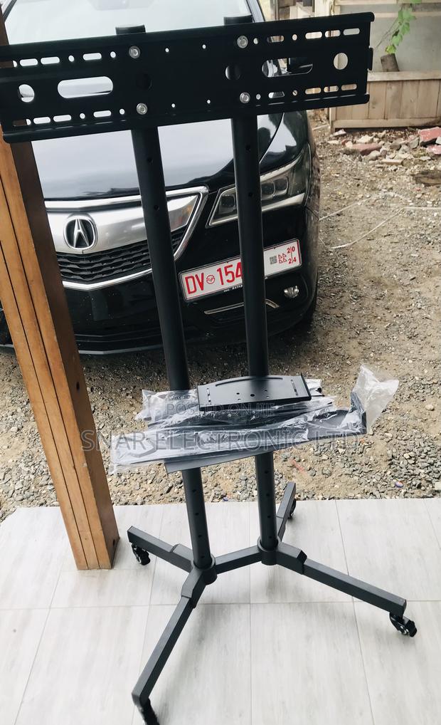 Genuinely TV Stand With Wheels Height Adjustable 32-65" · Photo 1