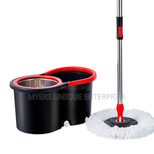 Easy to Use 360 Spin Mop Bucket With 2 Mop Heads · Photo 1