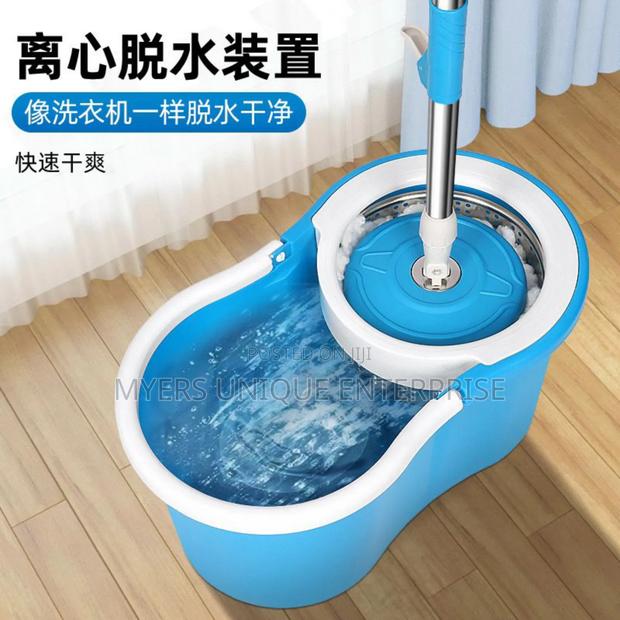 Authentic 360 Spin Mop Bucket With 2 Mop Heads · Photo 1