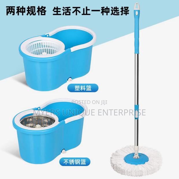 Affordable 360 Spin Mop Bucket With 2 Mop Heads · Photo 1