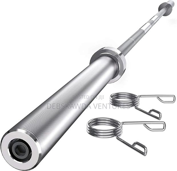 7ft Standard Olympic Bar 750lb Load Capacity · Photo 1