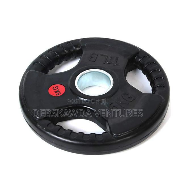 Single 5kg Olympic Plate · Photo 1